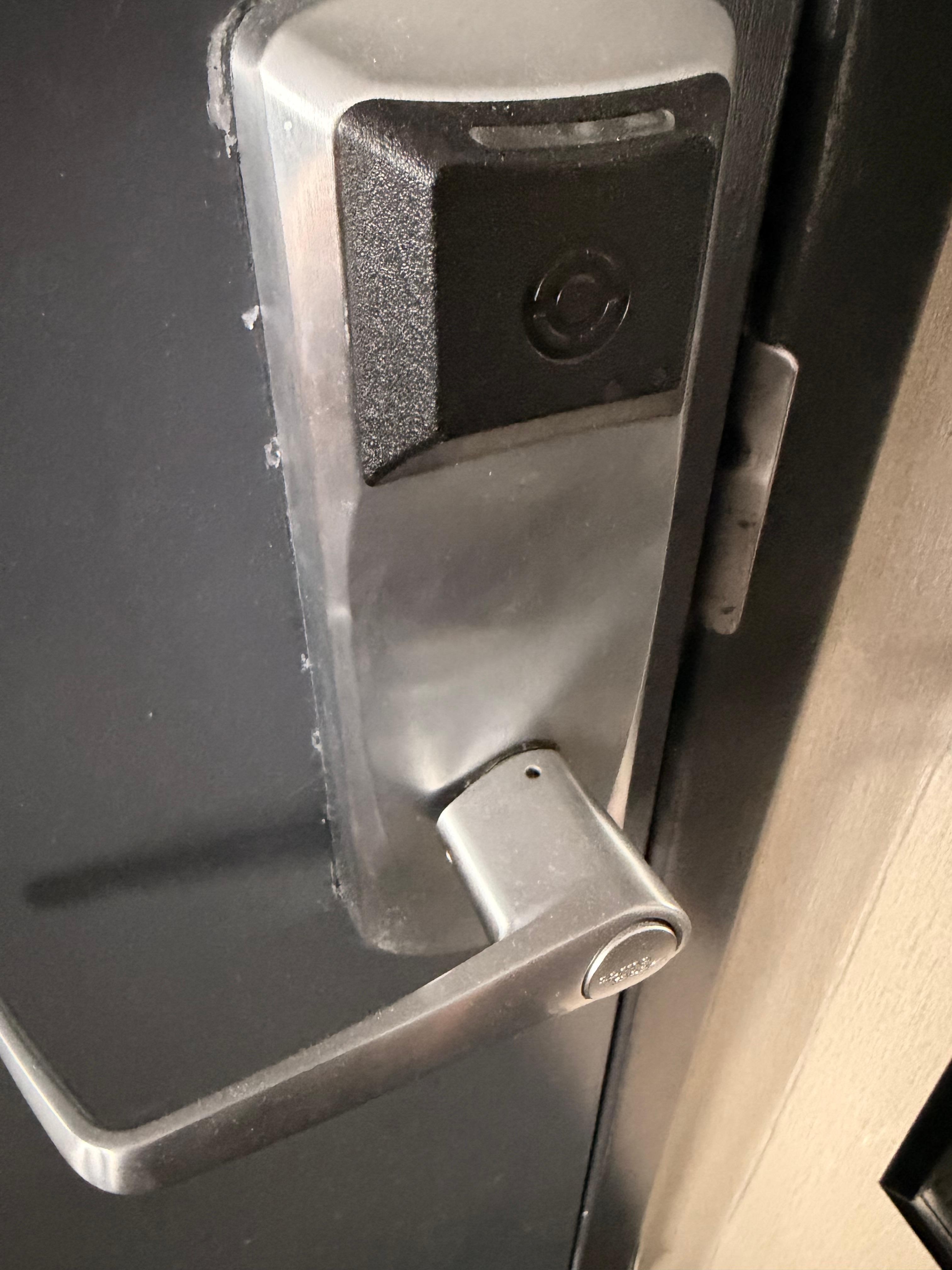 The knob to the room was not properly attached to the door