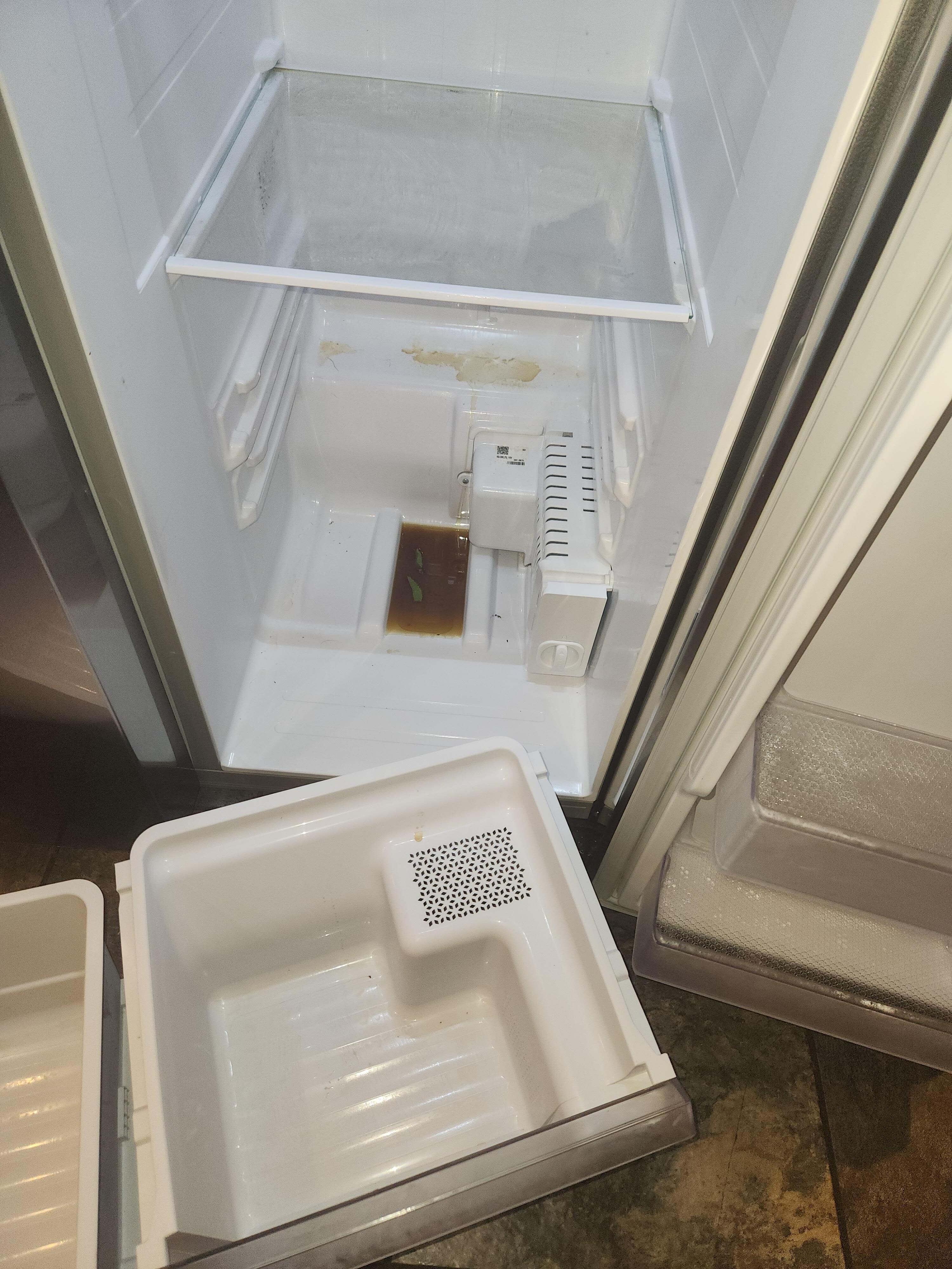 Dirty refrigerator upon our arrival
