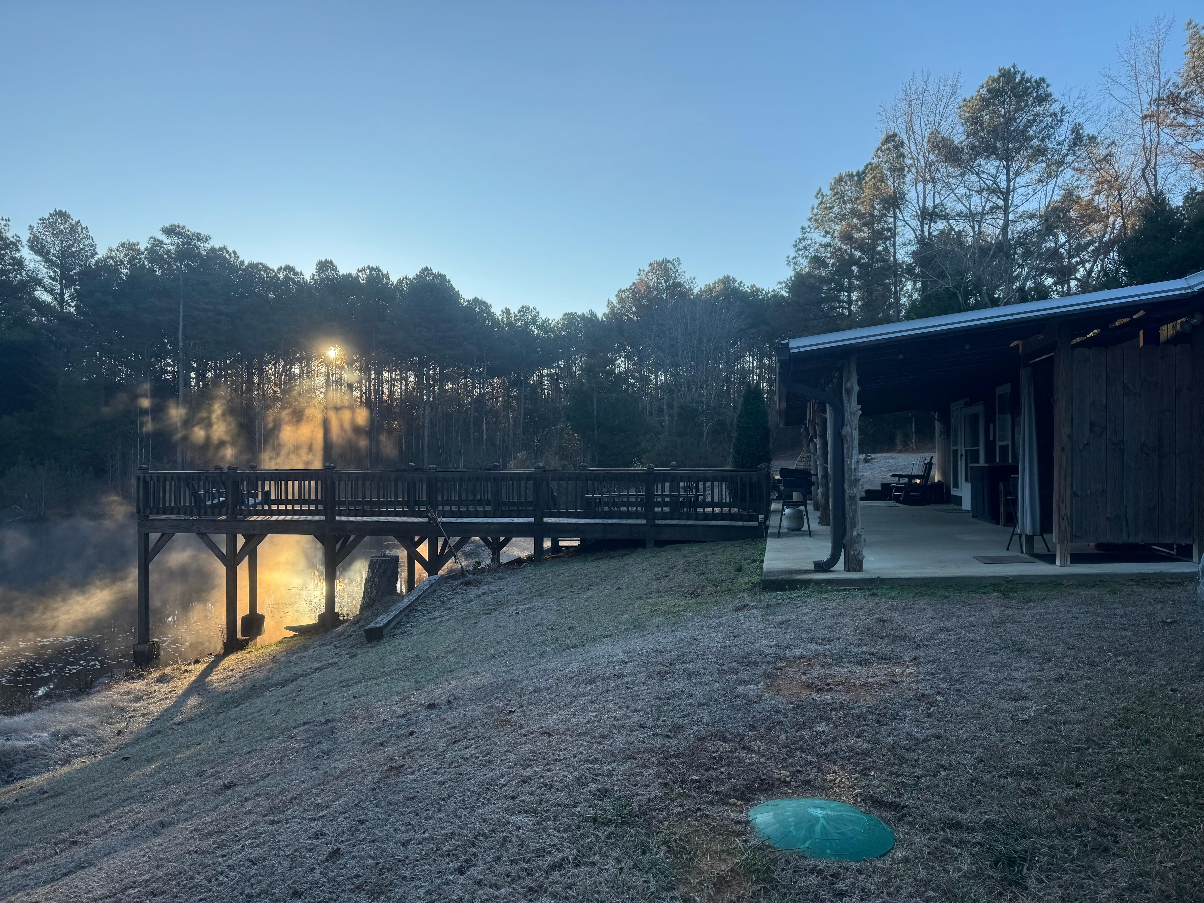 Cabin and dock at sunset