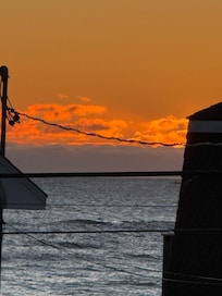 View of sunrise from upstairs deck
