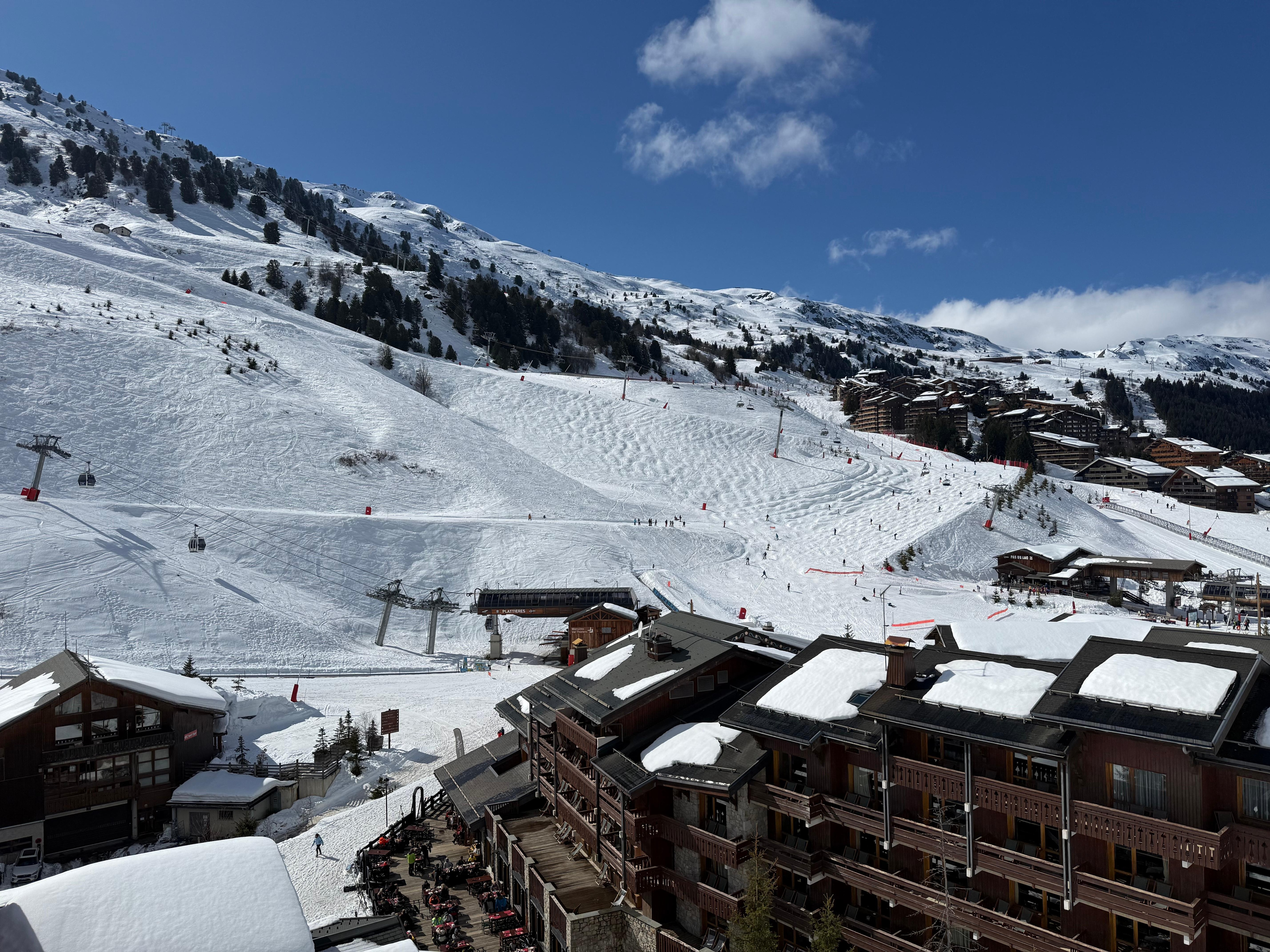 View of Plattiers lift & slopes leading to Meribel Mottaret town center. 