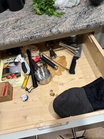 Drawer with spilled liquid