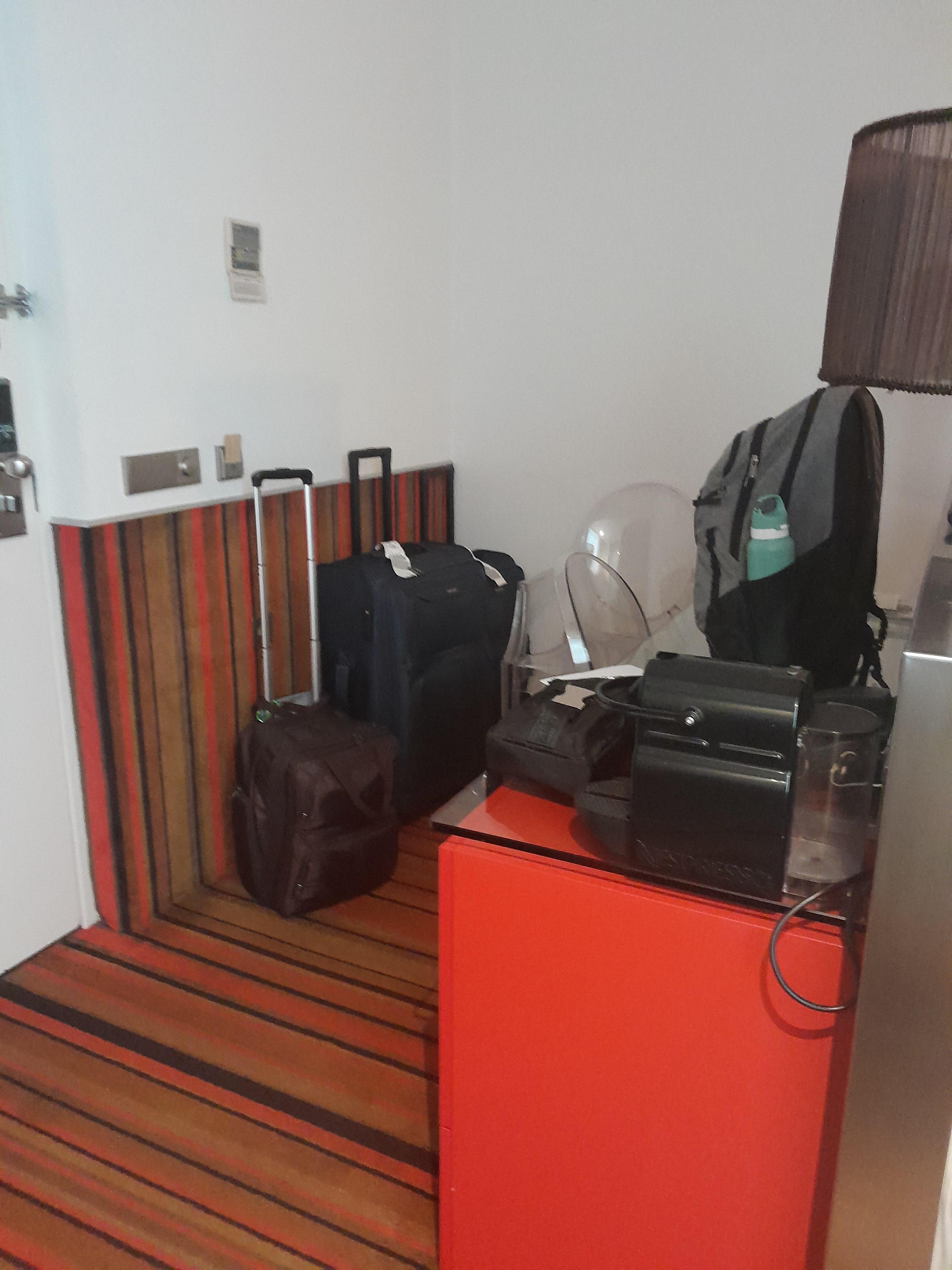 Entry door and desk backed up to bed, 2 chairs and no where to move, they did have a small side closet we did not use.