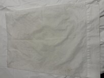 "Clean" pillow case I obtained from cleaning staff tray. Has plenty of black marks on it.