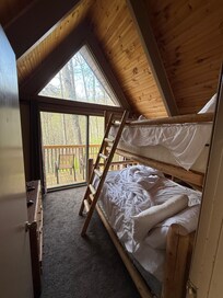 Bunkbed room. Double bed on bottom.