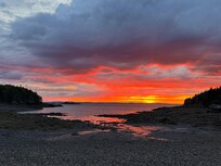 Nearby beach at low tide and sunset. Can walk the sea floor with many treasures.