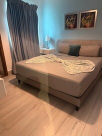 One of the beds in the room