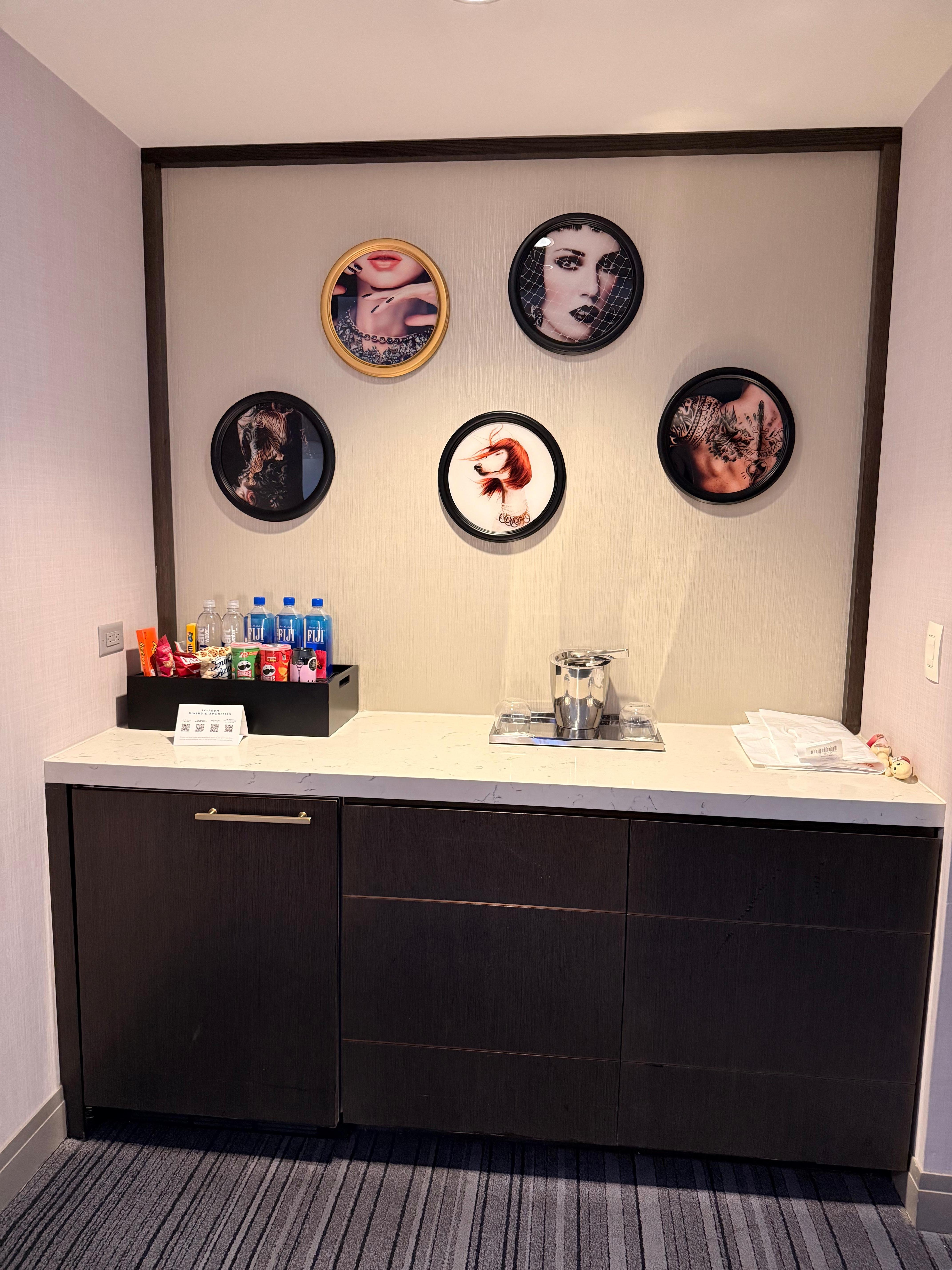 Mini bar. Don’t touch or rearrange anything. This room is also equipped with a mini fridge, glasses, and ice bucket. 