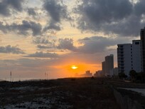 Sunset through the clouds.