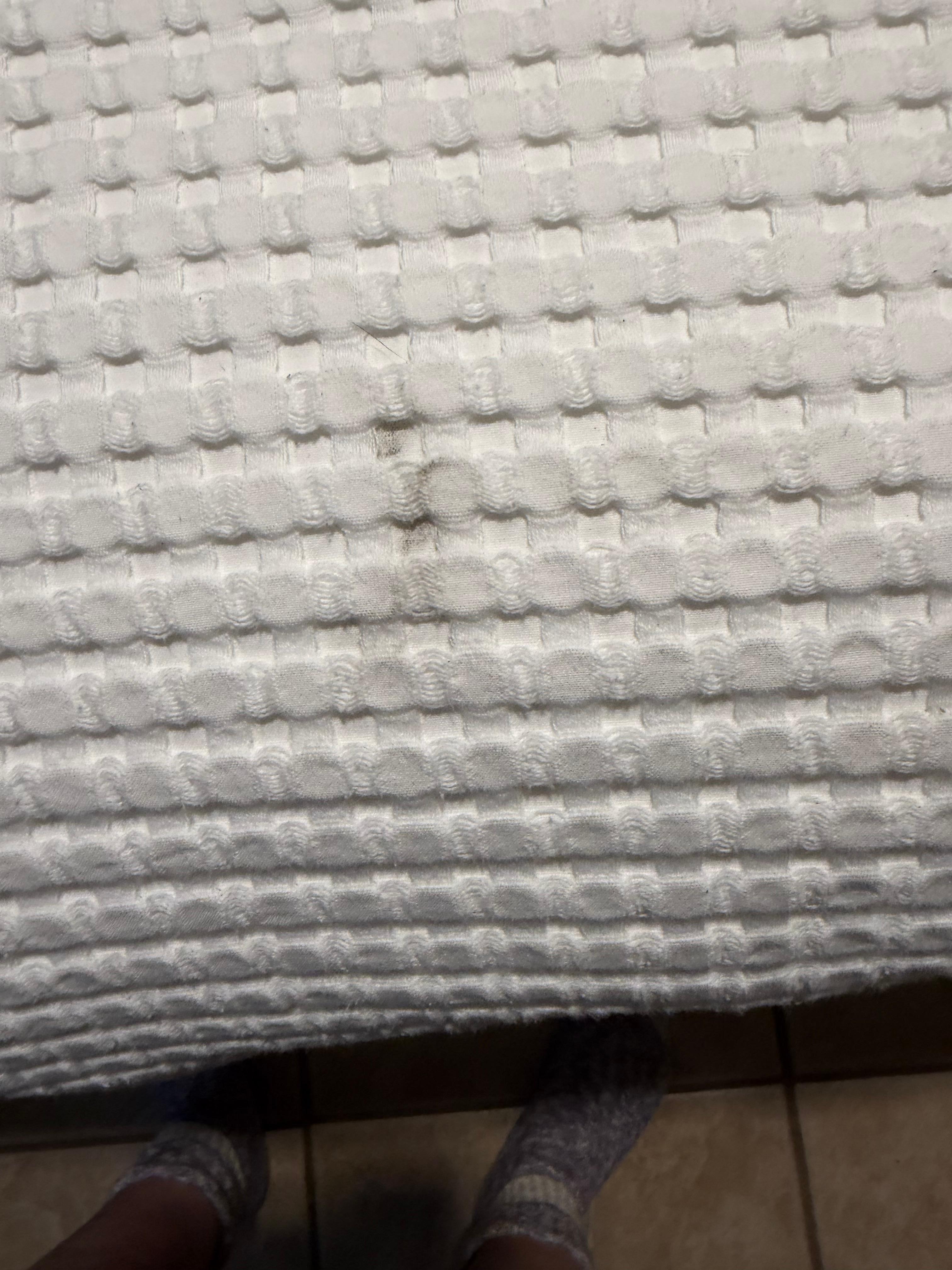 Dirt on bed spread