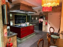 Communal kitchen with multiple stove counter/refrigerators