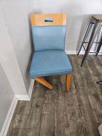 Broken dining chair that a family member was almost hurt in!