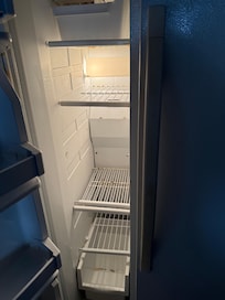 Freezer rusted shelves & ick on the bottom