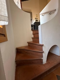 Stairs to kitchen and bedroom