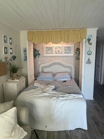 Living room with Murphy bed.