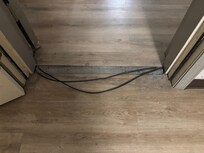 Floor transition and loose wires in between the two rooms