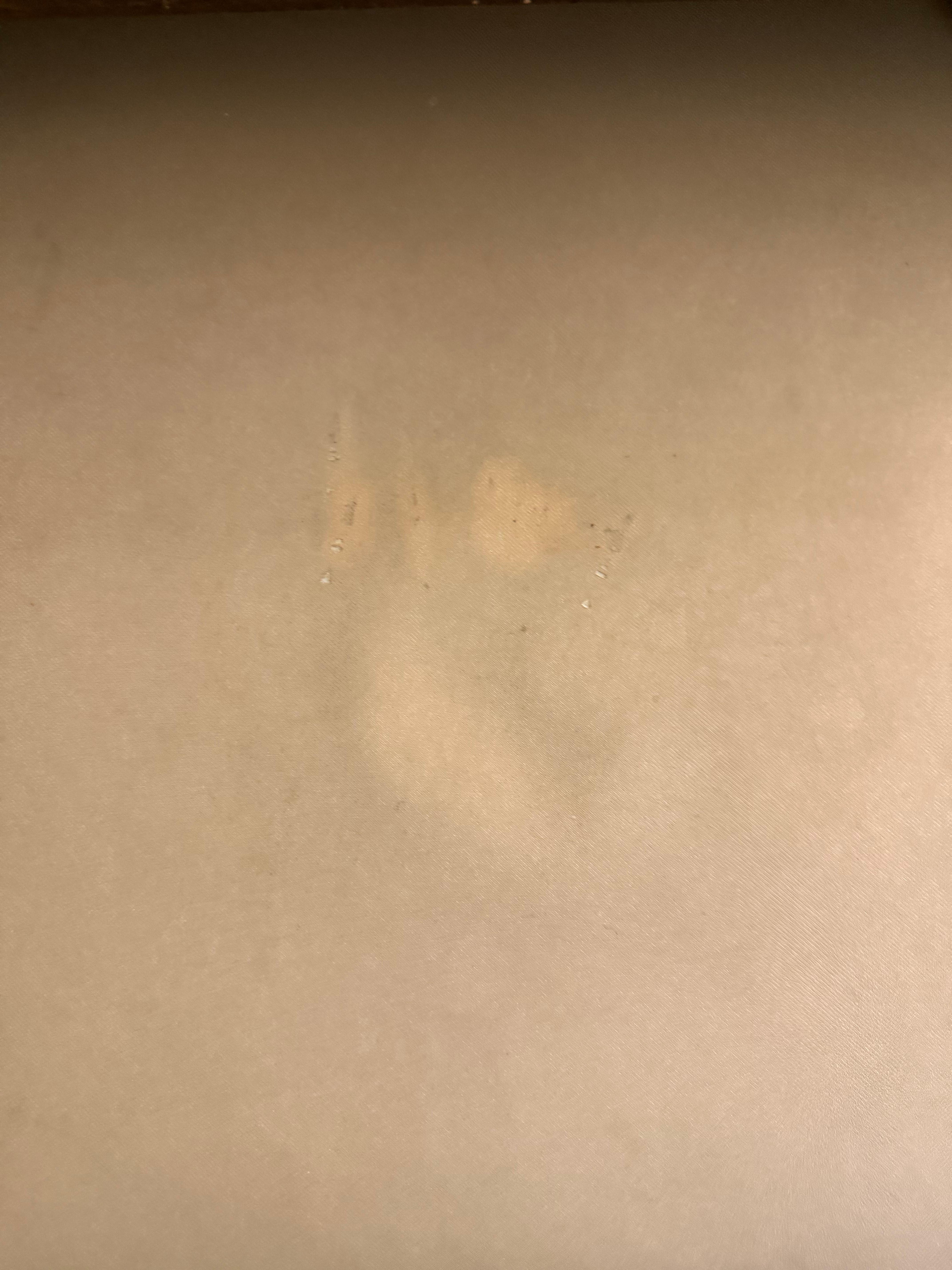 Stains and wear on the ottoman