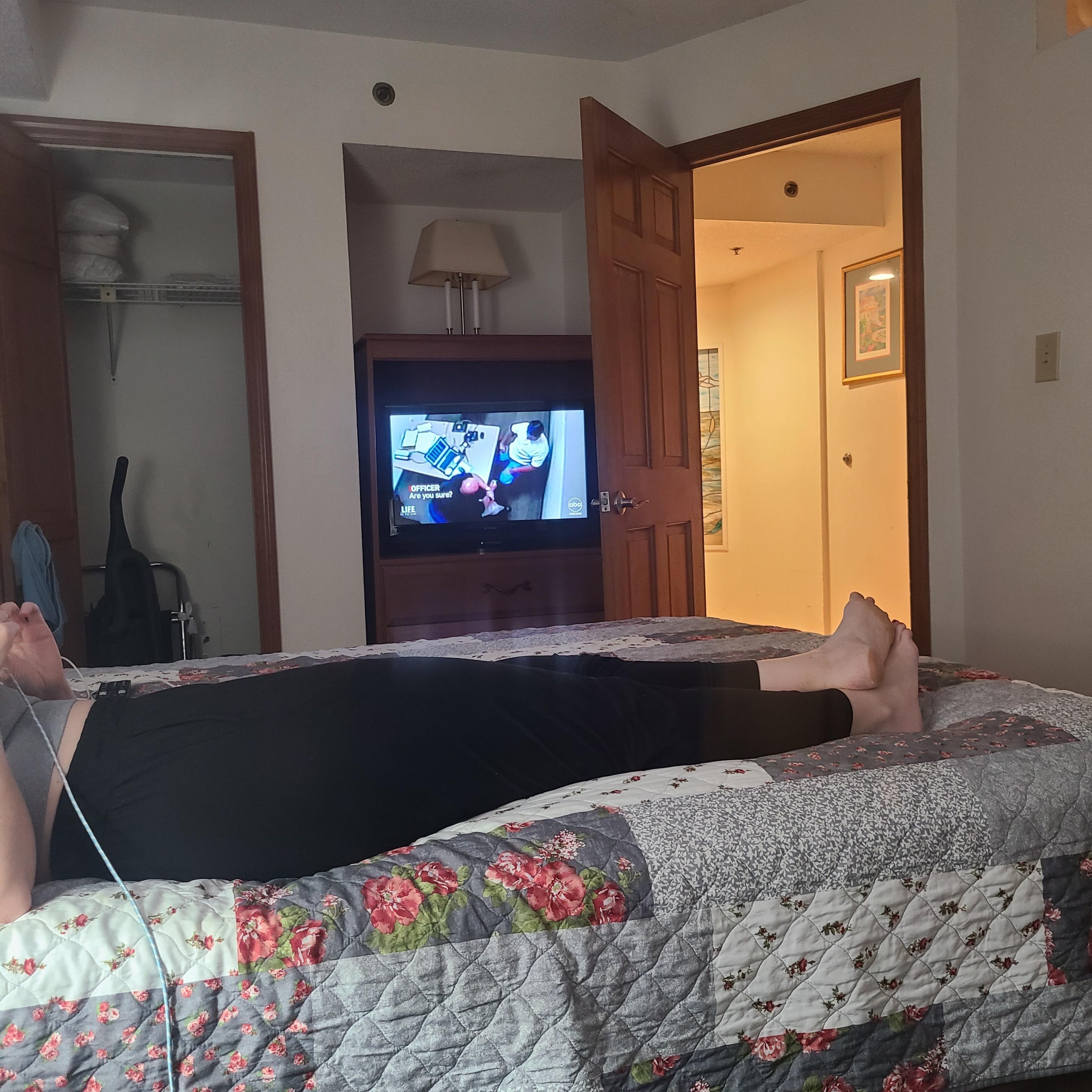 Can't comfortably watch tv with it located there, every other unit I've been in here with the same layout has it mounted on center wall.