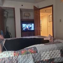 Can't comfortably watch tv with it located there, every other unit I've been in here with the same layout has it mounted on center wall.