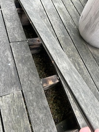 Broken decking on balcony