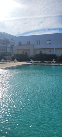 Apartment from early morning poolside