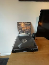 Turntable and albums for guest to listen to.
