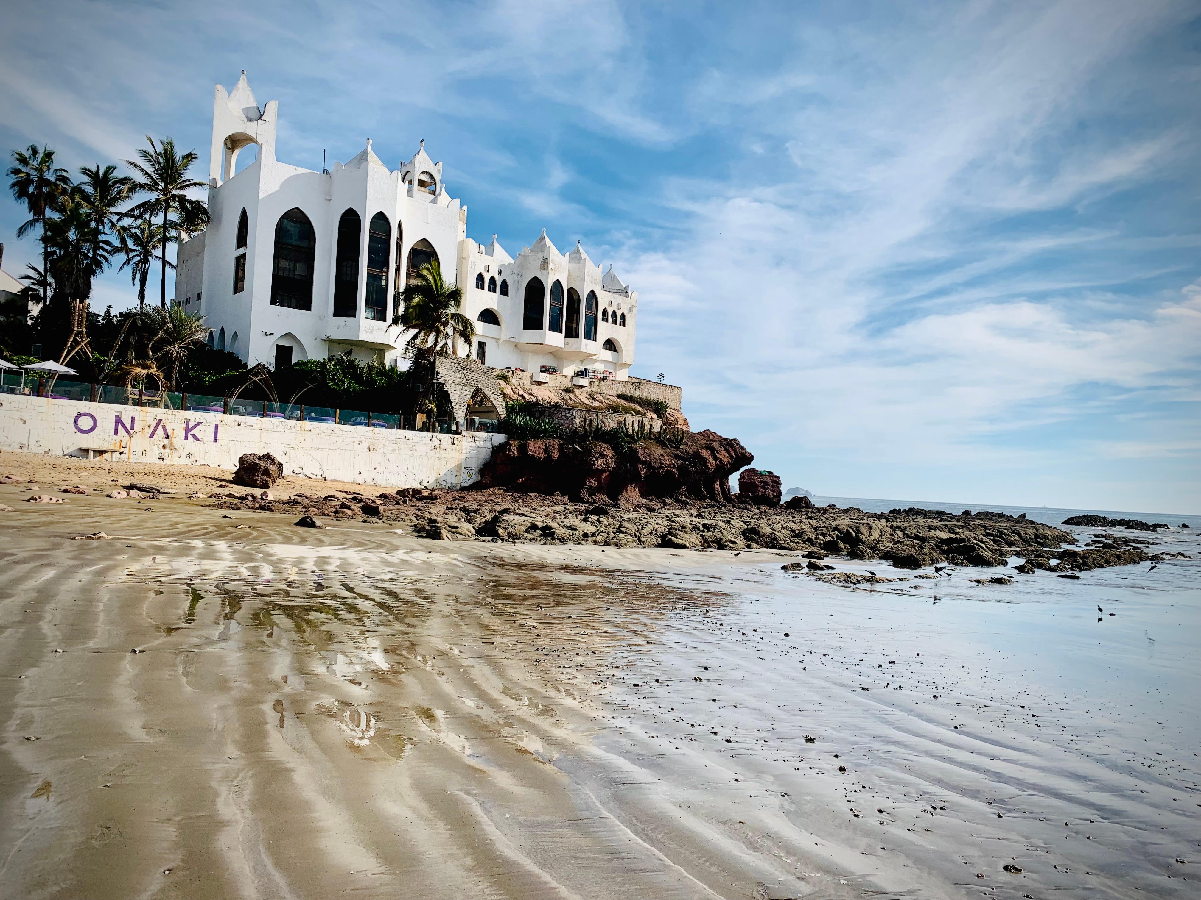 View from hotel beach of neighboring architecture 