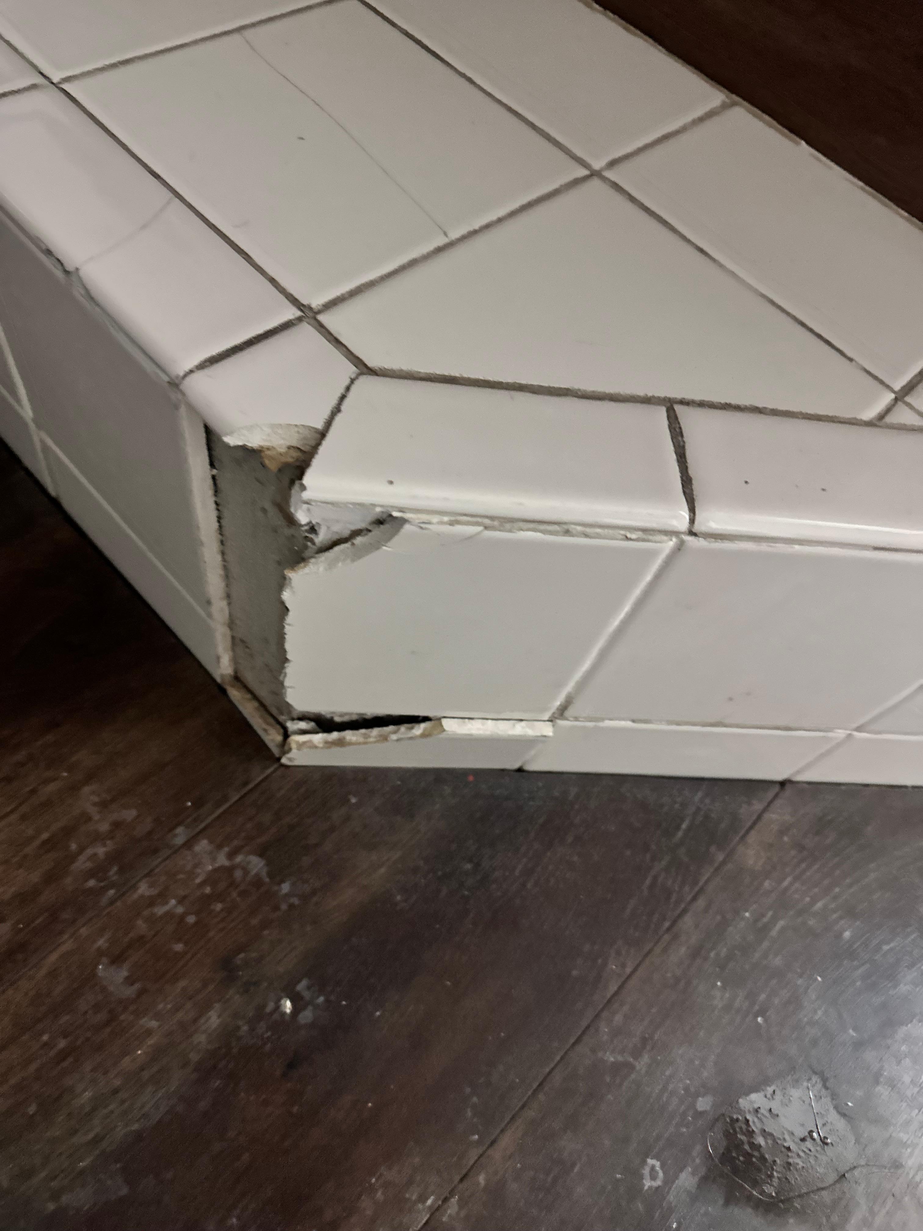 Tile broke around jacuzzi in two places with very sharp edges. 