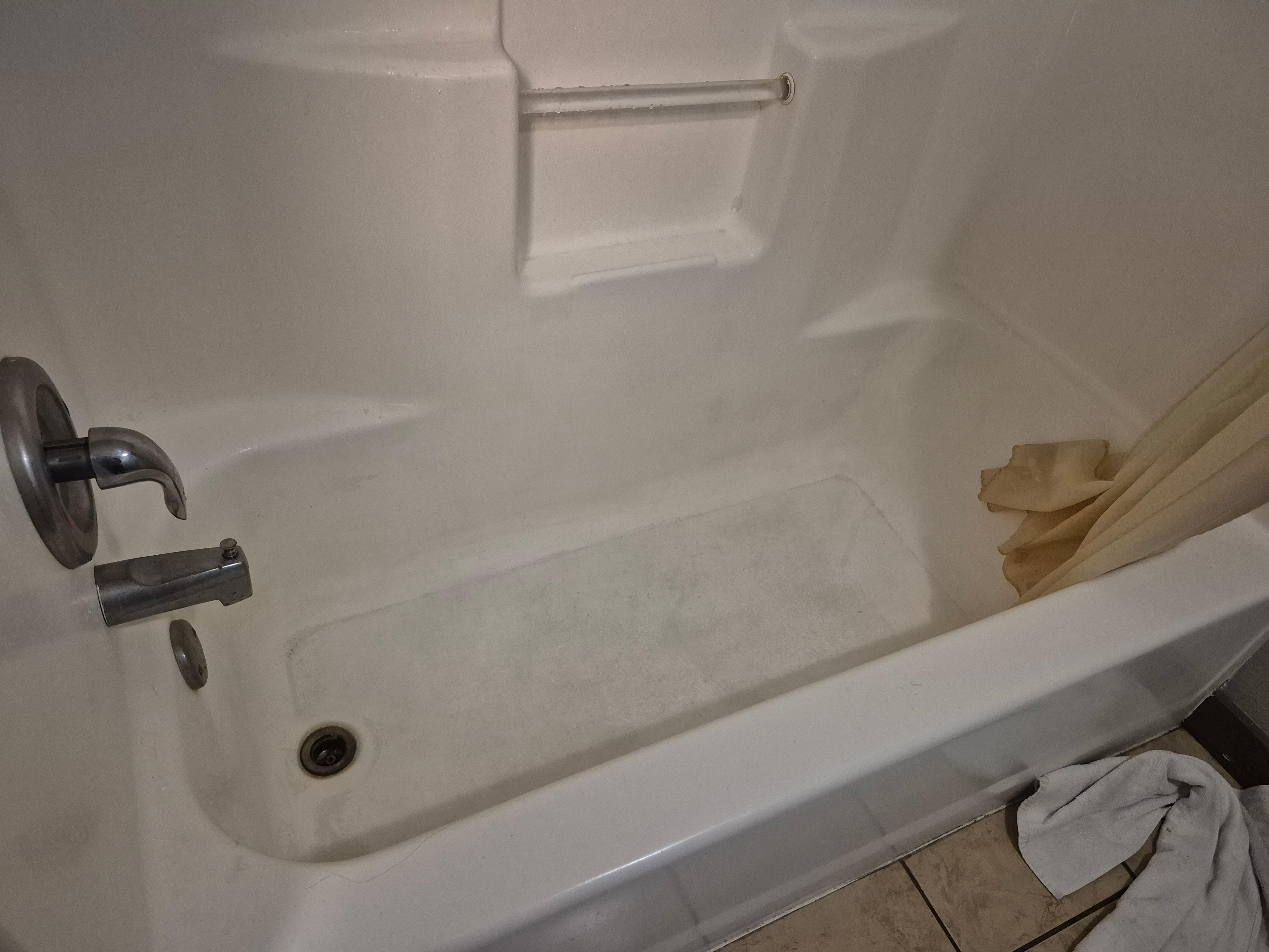 Tub was filthy, hair, soap scum, shower liner needed cleaned/replaced