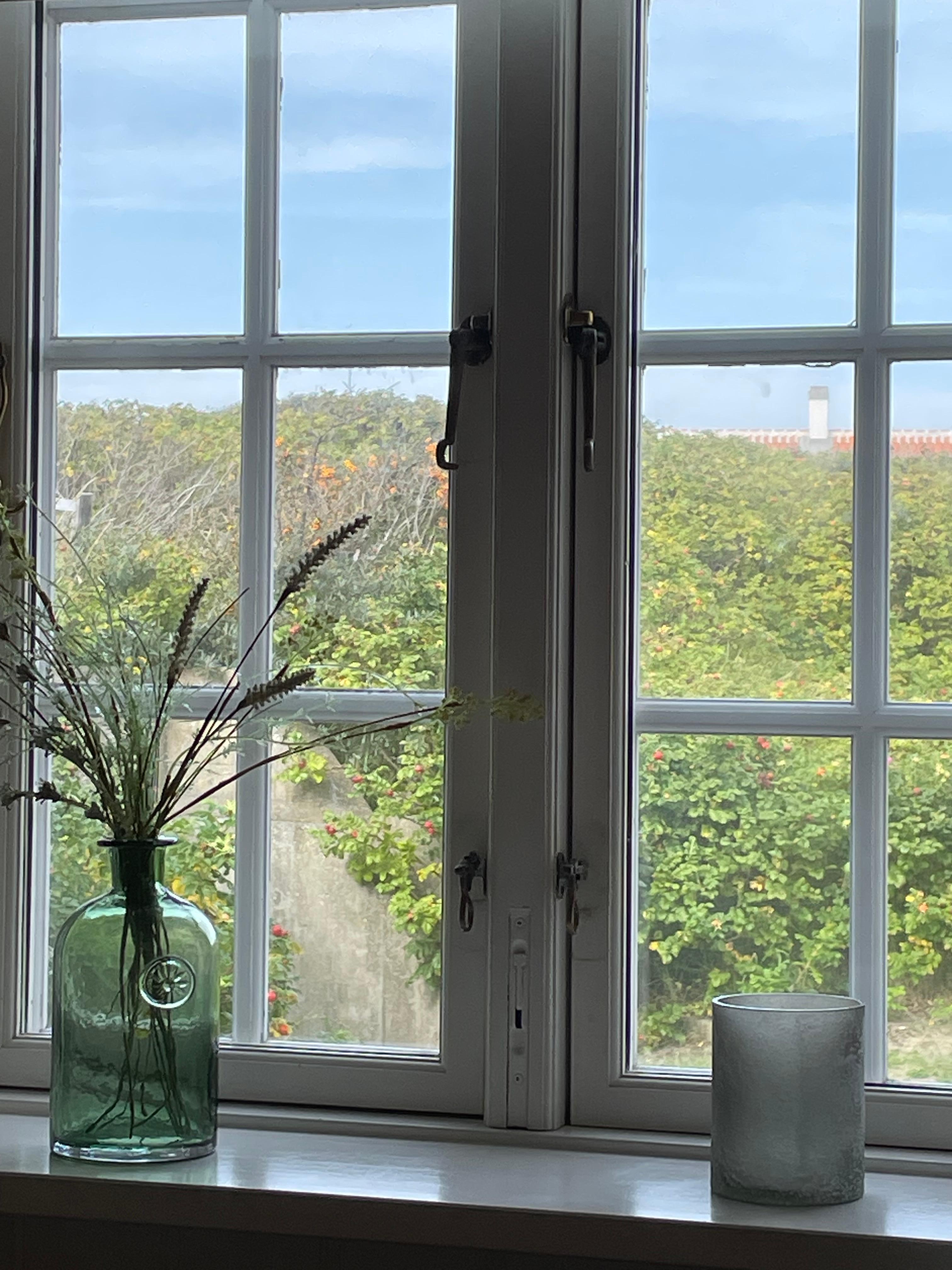 Klitten med fin strand på baksiden