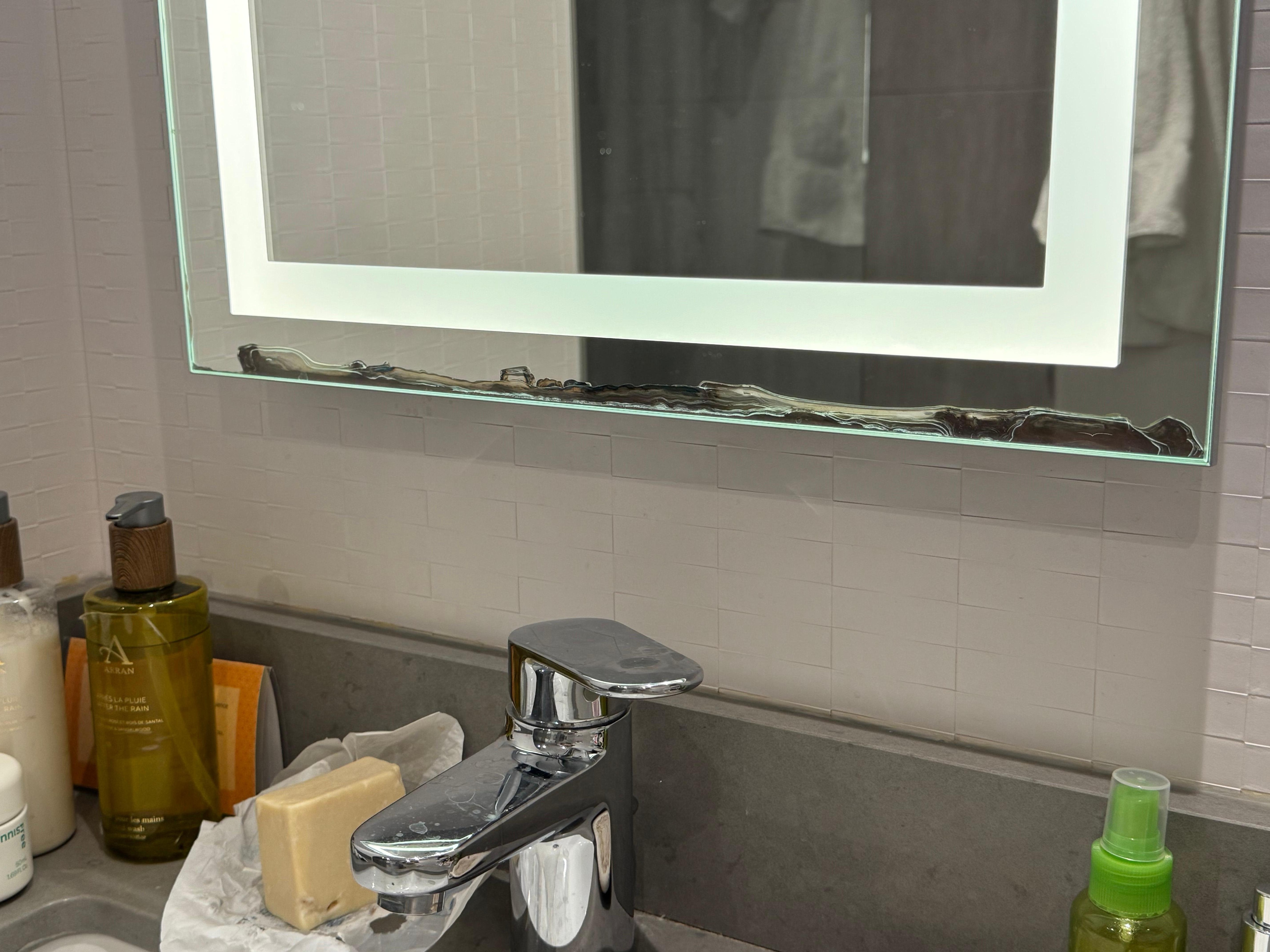 Bottom of mirror in the bathroom 