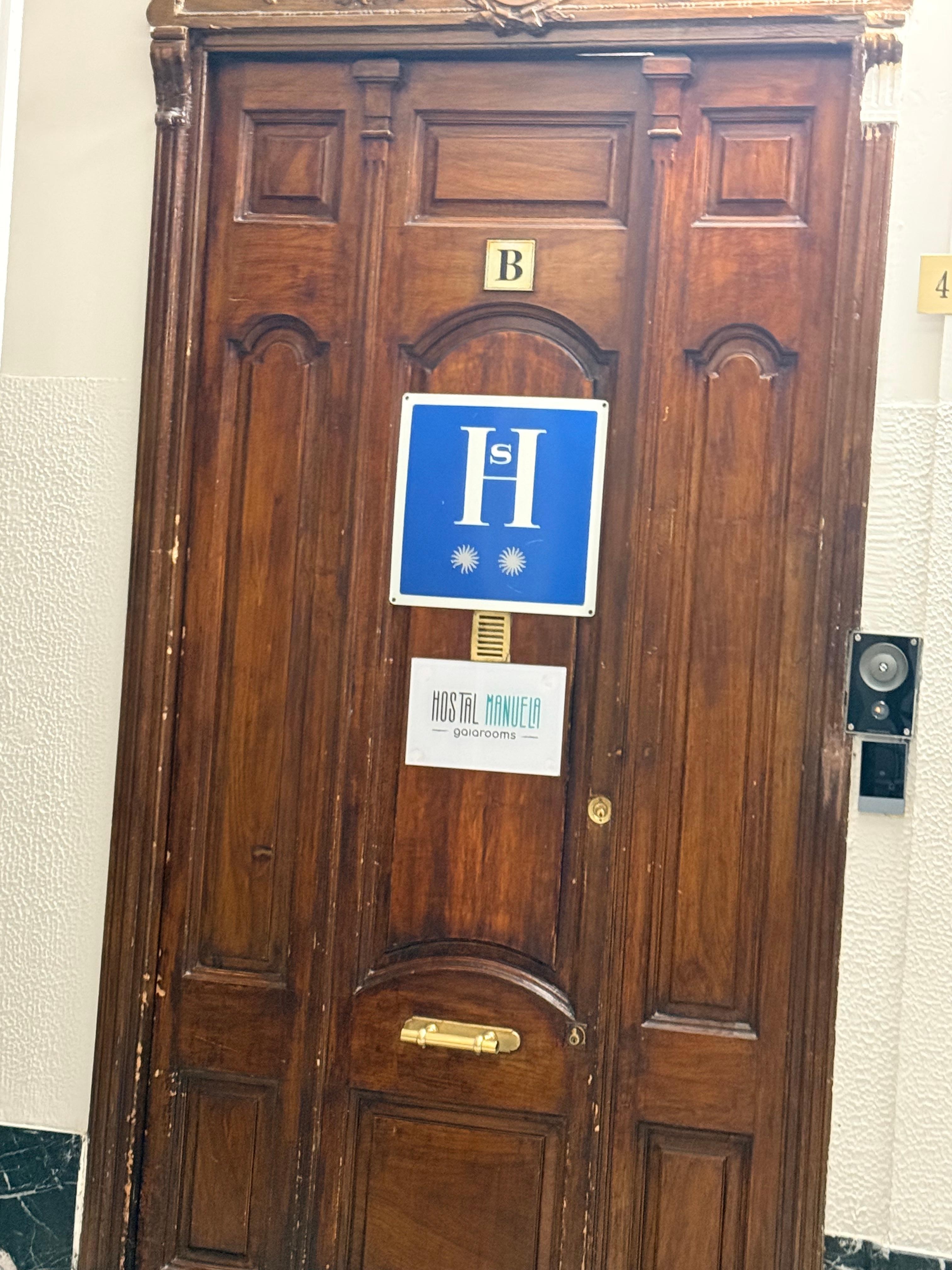 Other business  within the shared floor which identify themselves as hostal. 