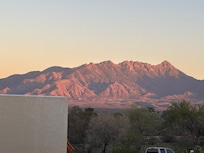 Santa Rita mountains from back patio at sunset