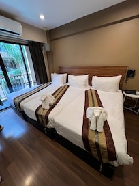 Our room, triple twin room.