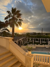 The view from our room. Beautiful sea and pool view