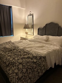 Bedroom with giant pillow’s removed