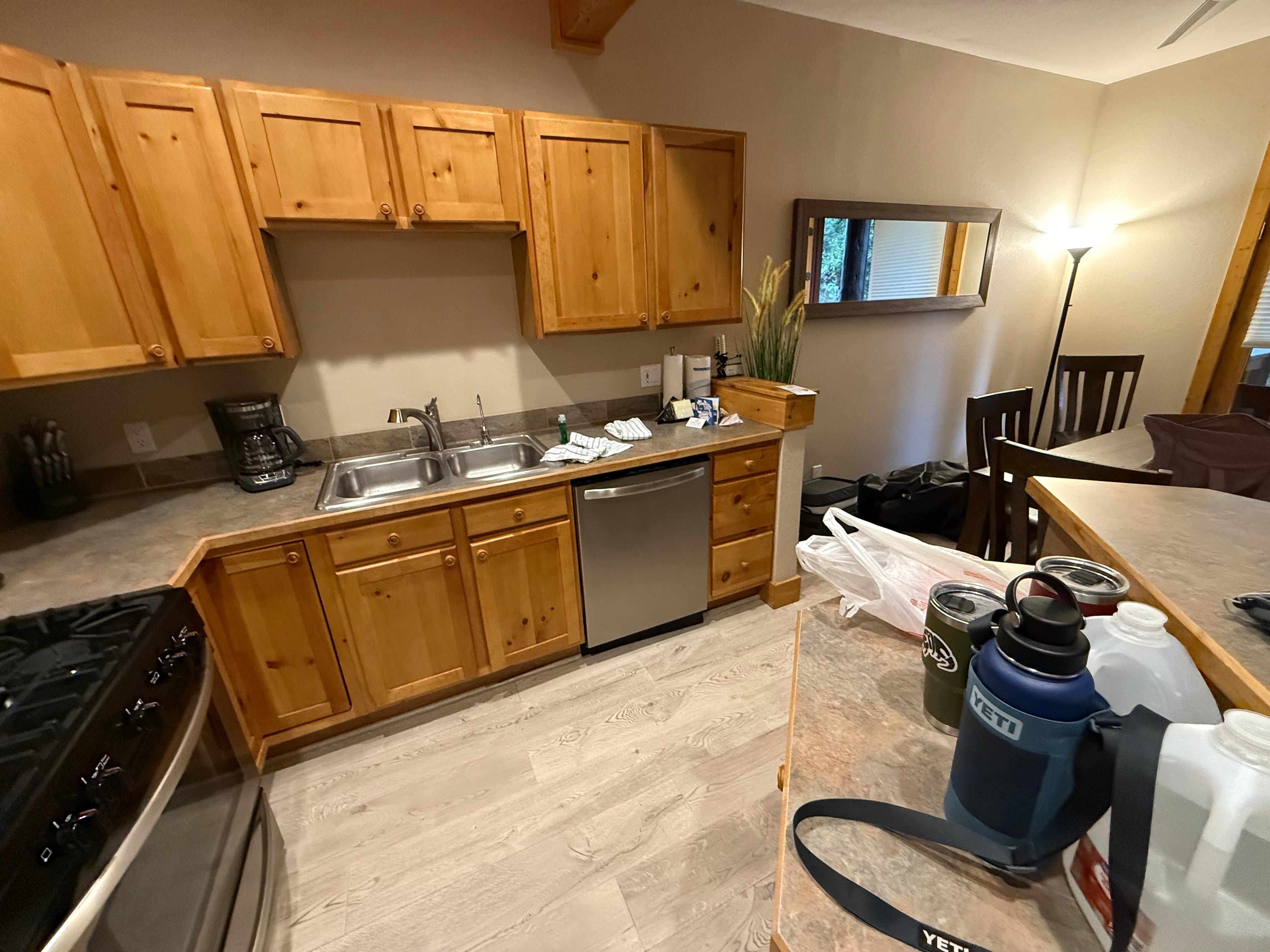 Well stocked kitchen including dishwasher