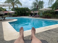 By the smaller pools.