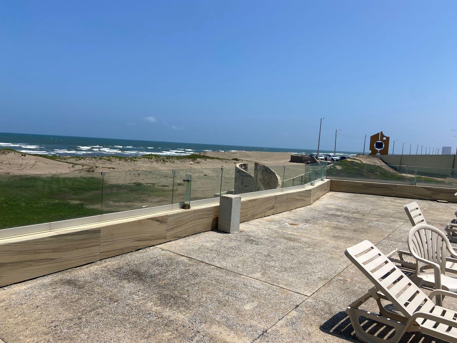 Acceso y vista a la playa