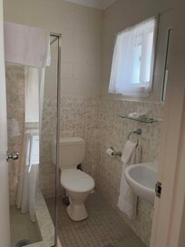 bathroom with provided soap, shampoo & conditioner!