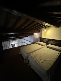 Lofted bed in the double deluxe room