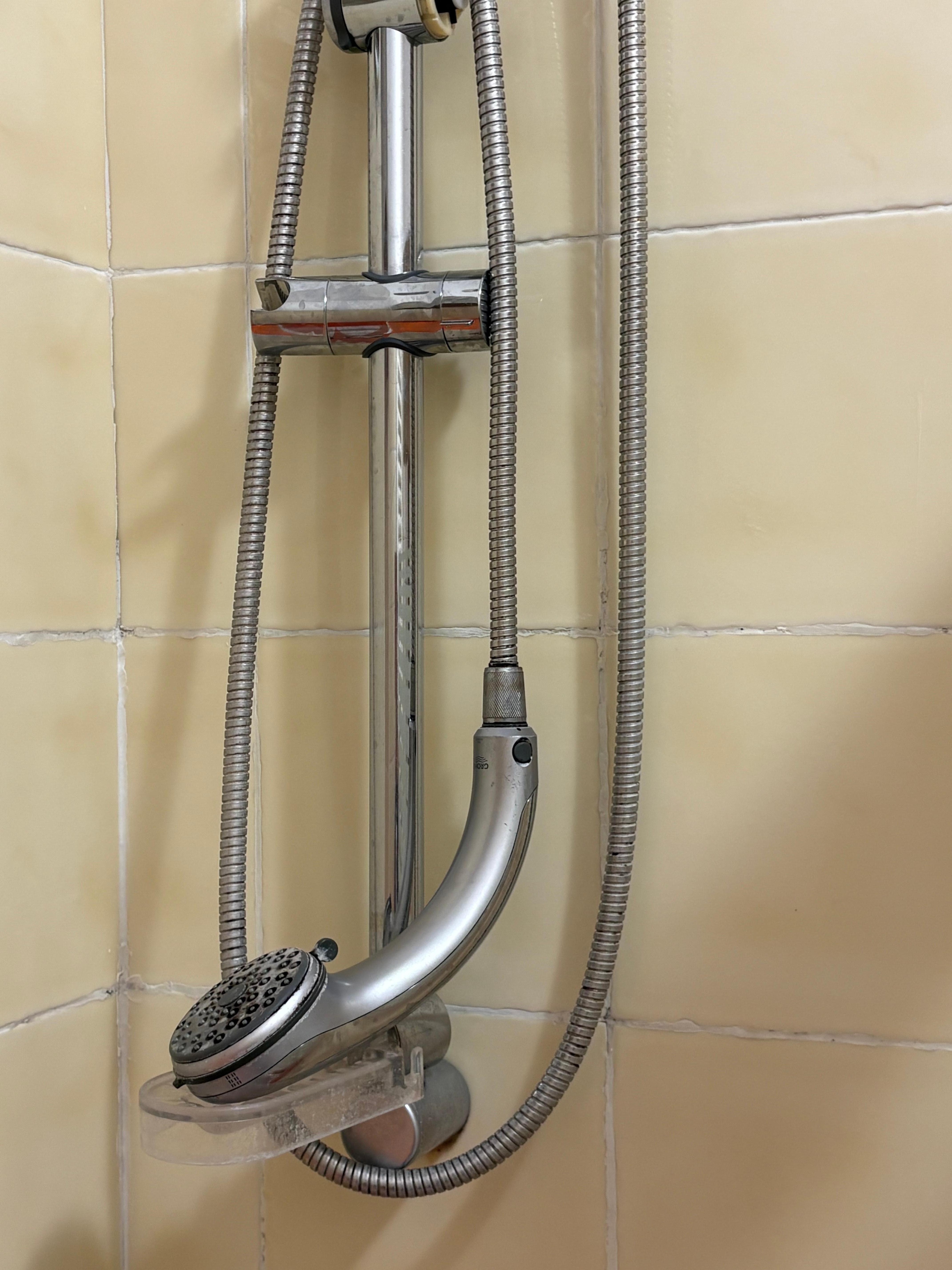Broken clasp on shower head.