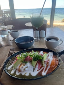 Breakfast on the beach every morning.