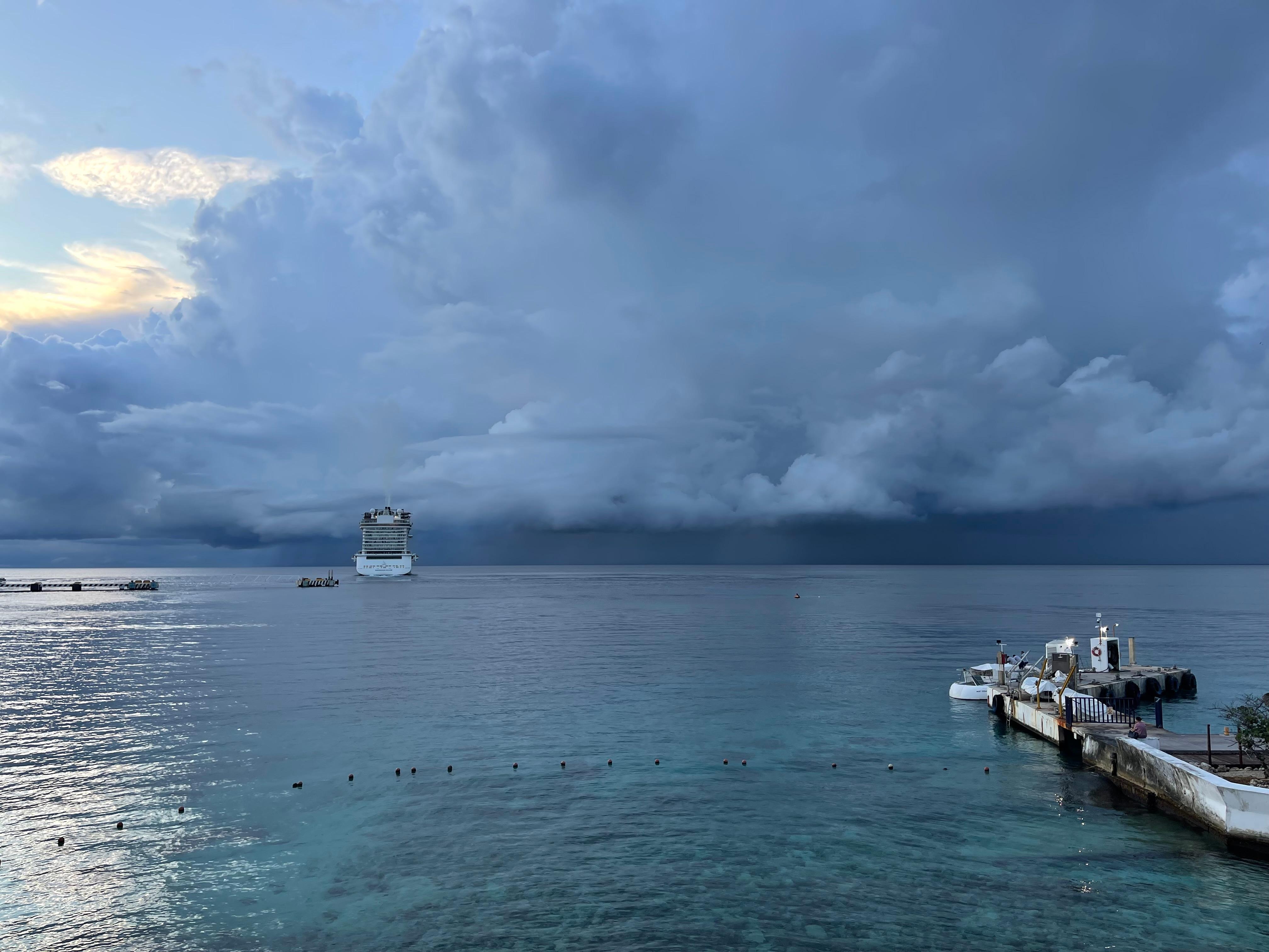 View of a storm from the walkway in front of hotel