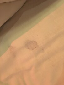 Blood stained mattress protector