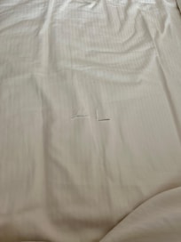 Torn bed sheets