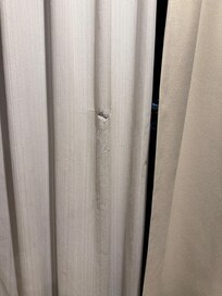 Damaged curtain.