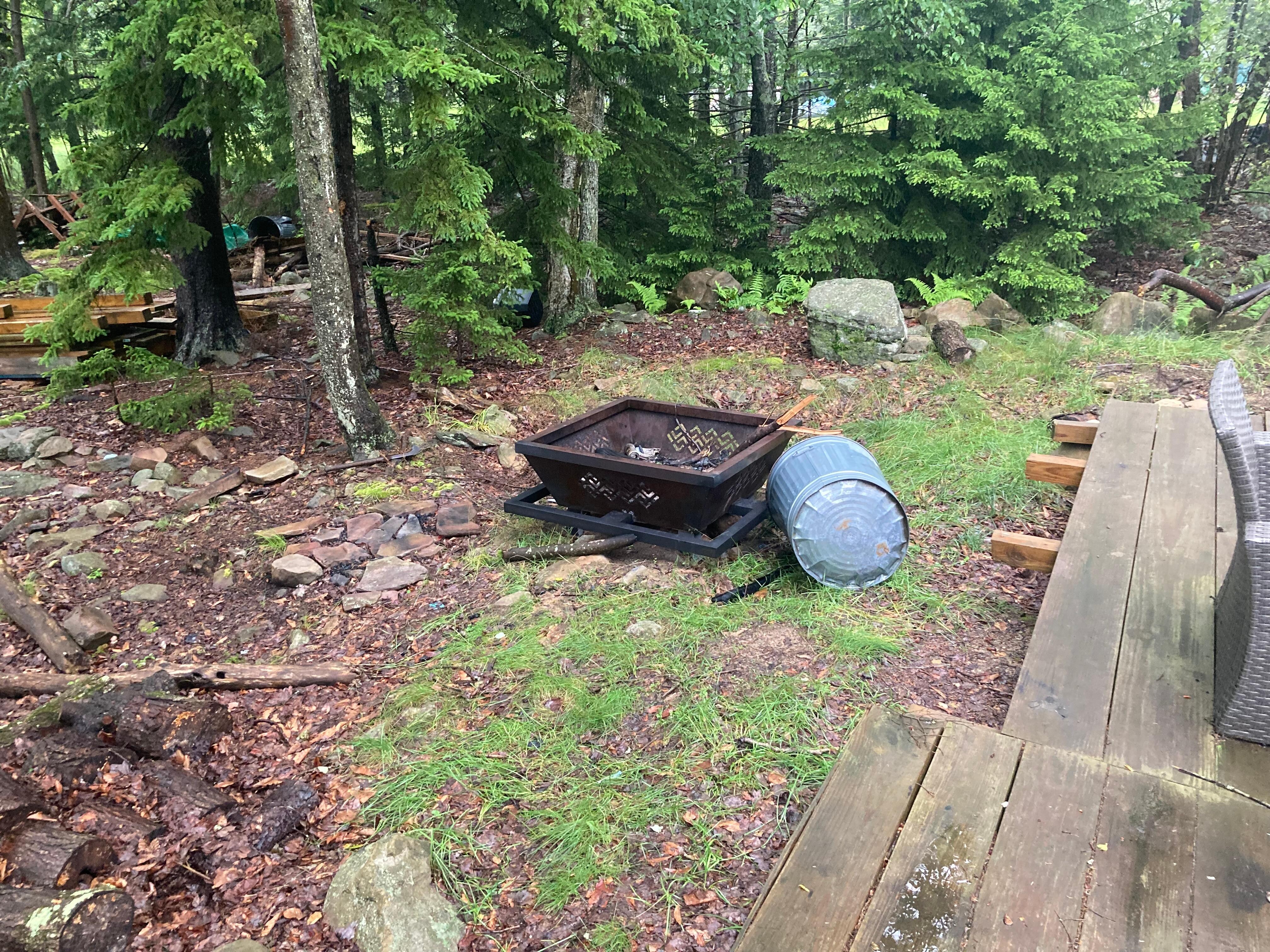 Firepit was filled with garbage we had to clean  out.