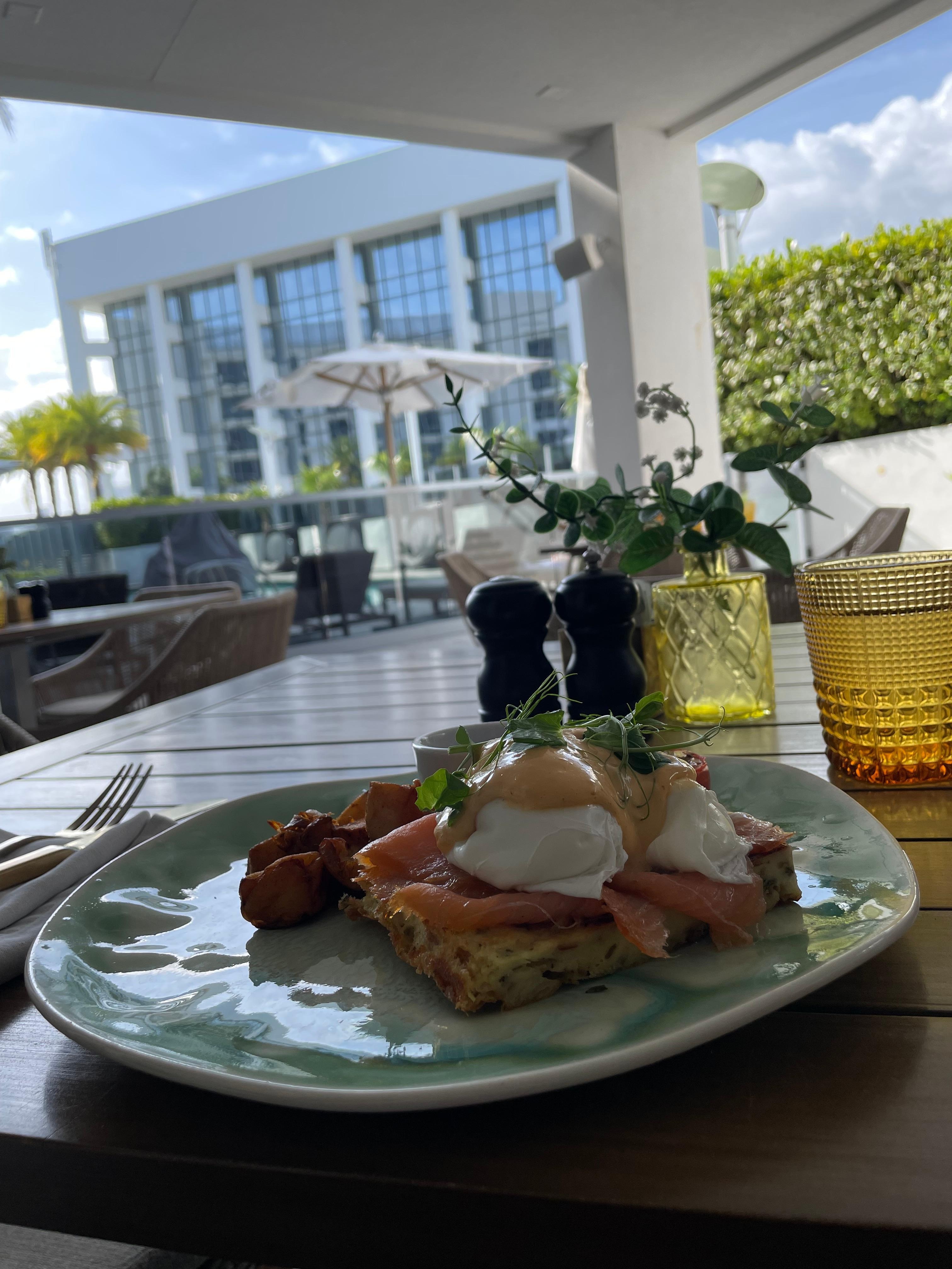 Eggs Benedict w/ salmon and savory bread pudding
