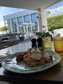 Eggs Benedict w/ salmon and savory bread pudding